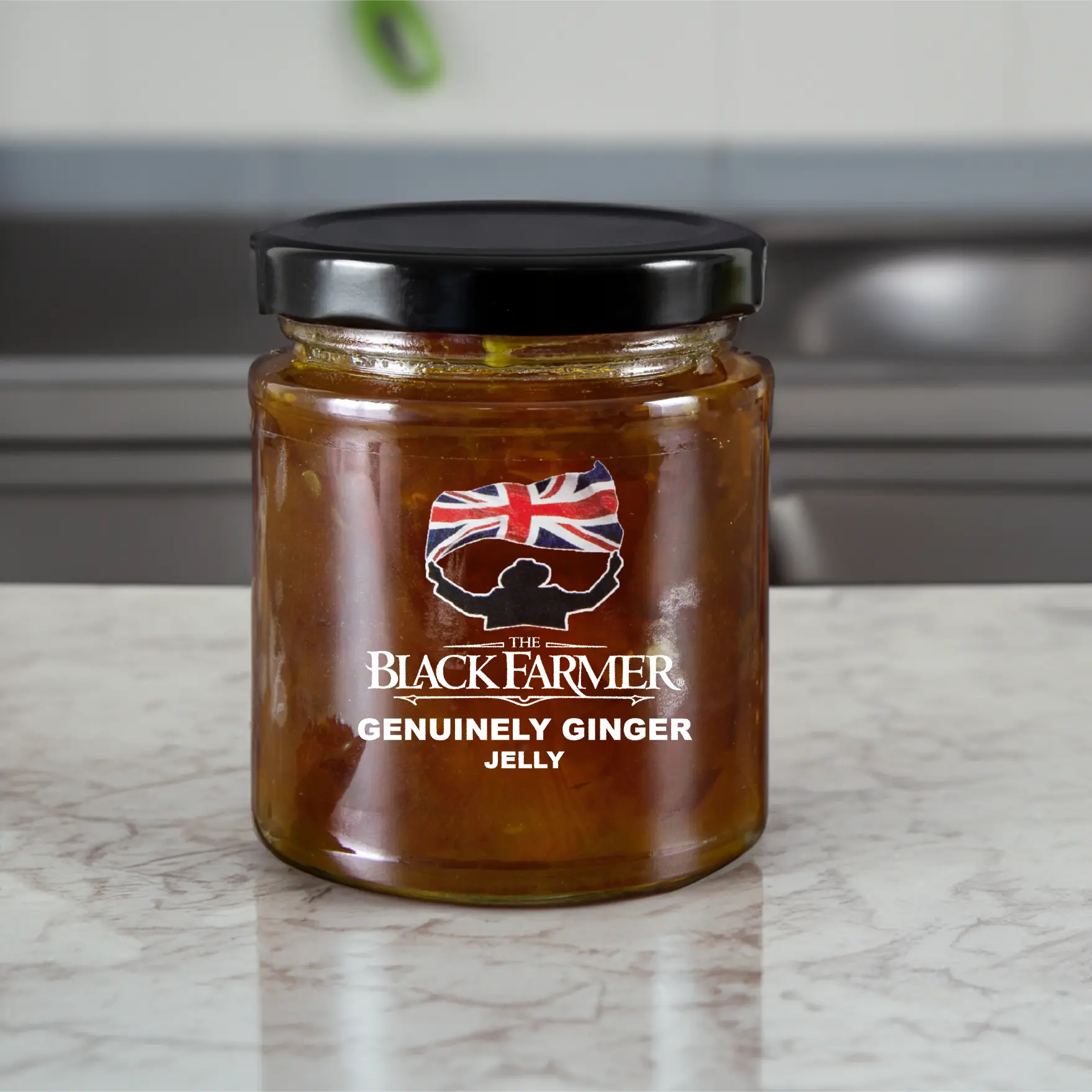 A jar of The Black Farmer’s Genuinely Ginger Jelly, showcasing a golden-coloured jelly and a ginger root illustration.